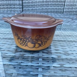 Vintage Pyrex Old Orchard Harvest Fruit Casserole with opalware lid.